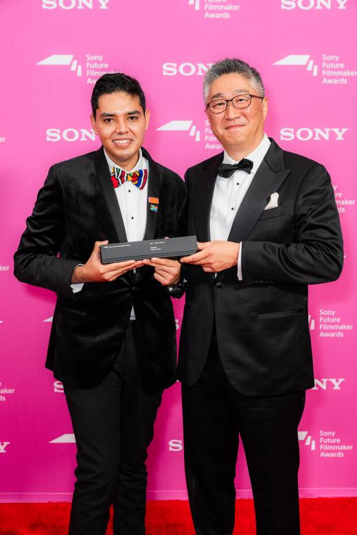 Ken Morisawa, Head of Sony Europe with Raheem Razak, winner of the Student category at the Sony Future Filmmaker Awards 2024 ceremony